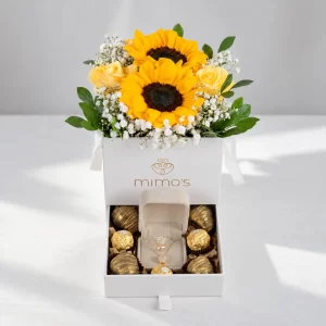 Box de regalo con girasoles, rosas amarillas, chocolates y joyería