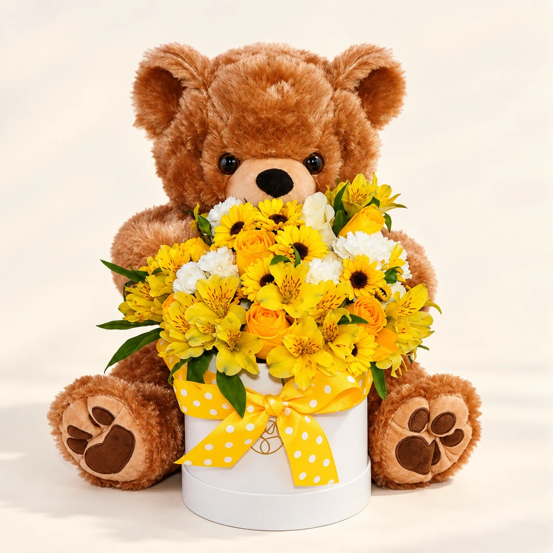 Sombrerera floral con flores amarillas y blancas y oso de peluche