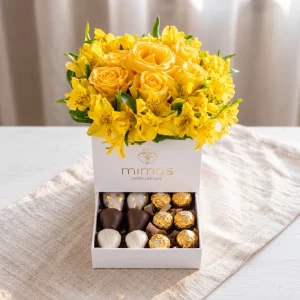 Box de flores amarillas con chocolates de Mimos